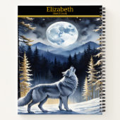 Ein Wolf heult unter Vollmond in einem verschneite Notizblock (Rückseite)