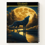 Ein Wolf serenades den bezaubernden Vollmond in de Notizblock (Rückseite)