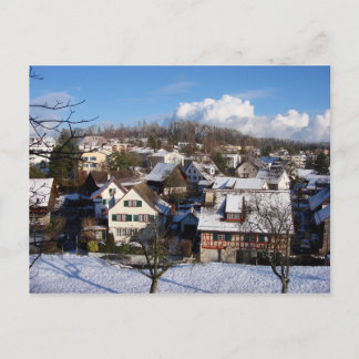 Ein zauberhaftes Winterdorf Postkarte