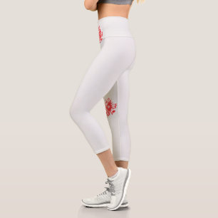 ein zeichn einer roten Blume auf weißem Hintergrun Capri Leggings