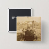 Eine ägyptische Bewässerungs-Maschine auf den Button (Vorne & Hinten)