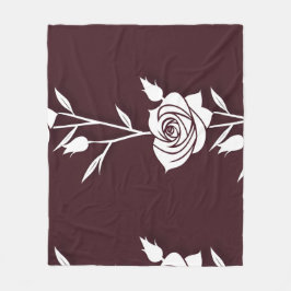 Eine Anordnung minimalistischer Rosen in einer Lin Fleecedecke