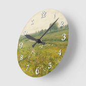 Eine ausgedehnte Wiesen-Landschaft mit Gänsen Runde Wanduhr (Winkel)