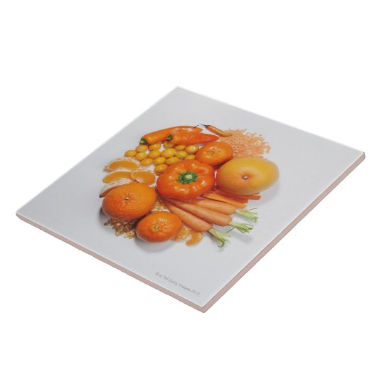 Eine Auswahl der orange Früchte u. des Gemüses Fliese (Seite)