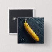 Eine Banane auf einer dunklen Oberfläche Button (Vorne & Hinten)