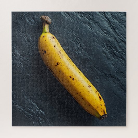 Eine Banane auf einer dunklen Oberfläche Puzzle (Vertikal)
