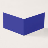 eine blaue Mauer mit einer Uhr darauf (Vorderseite)