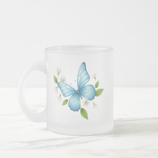 Eine blaue Schmetterling-Frostglas-Tasse Mattglastasse (Links)