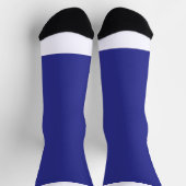 eine blaue Wand mit Uhr Socken (Oben)