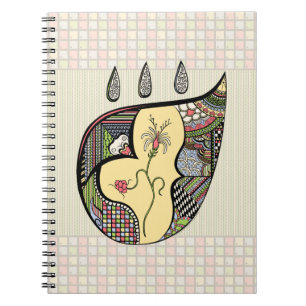 Eine Blume im Notebook Notizblock