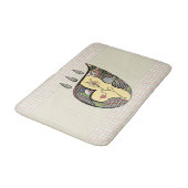 Eine Blume innerhalb der Badematte (Schrägansicht)