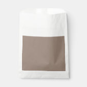 eine braune Mauer mit einer Uhr darauf Geschenktütchen (Vorderseite)