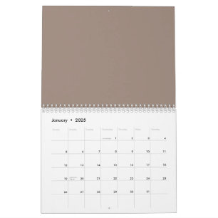 eine braune Mauer mit einer Uhr darauf Kalender