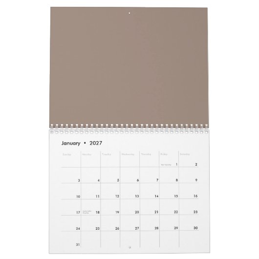 eine braune Mauer mit einer Uhr darauf Kalender (Jan 2027)