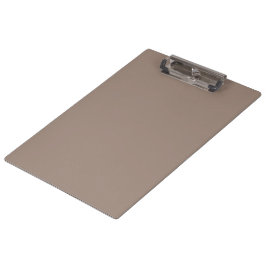 eine braune Mauer mit einer Uhr darauf Klemmbrett