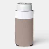 eine braune Mauer mit einer Uhr darauf Selters Dosenkühler (Seltzer Rückseite)