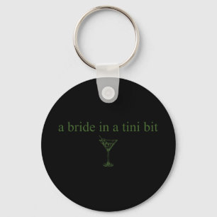 Eine Braut in einem winzigen Bride Schwanz Martini Schlüsselanhänger
