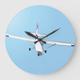 Eine Cessna im Flug Große Wanduhr