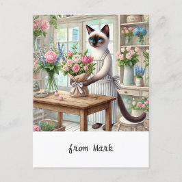 Eine charmante Katze sorgt für eine schöne Blume Feiertagspostkarte