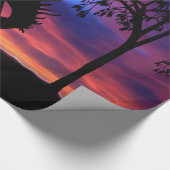 Eine Cowboy-Silhouette bei Sonnenuntergang Geschenkpapier (Ecke)