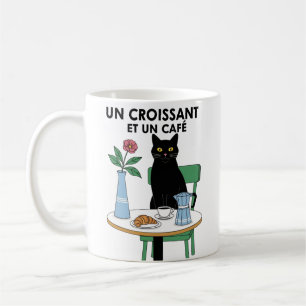 Eine Croissant-Katze Kaffeetasse
