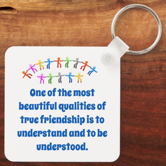 Eine der schönsten Qualitäten - Freundlichkeit Q Schlüsselanhänger (Rückseite)