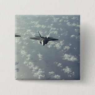 Eine Dreischiff Bildung der Raubvögel F-22 Button