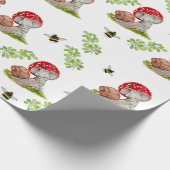 Eine farbenfrohe Waldfliege und eine Schnecke Geschenkpapier (Ecke)