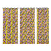 Eine flauschig graue Katze mit grünen Augen sitzt  Kalender (Titelbild)