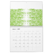 Eine Frau mit einem grauen Pullover und einer Bril Kalender (Mär 2027)