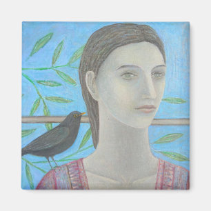Eine Frau und eine Amsel sind eine Magnet