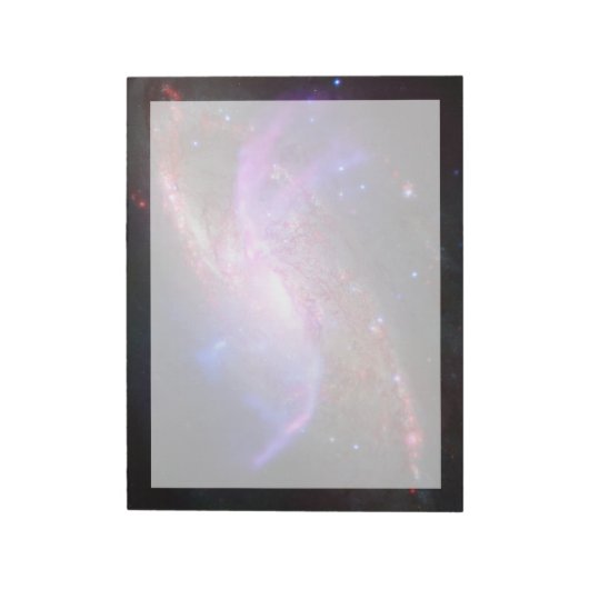 Eine galaktische Lichtshow in Spiralgalaxie Ngc 42 Notizblock (Rotiert)