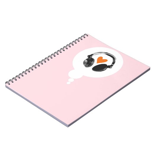 Eine Gedankenblase mit einem Herzen und Kopfhörern Notizblock (Linke Seite)