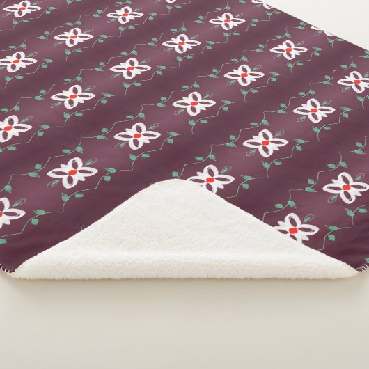 Eine geflochtene Decke mit Rot und Pflaume Sherpadecke (3/4)