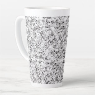 Eine gemusterte, optisch ansprechende, weiße und s milchtasse