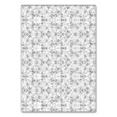 Eine gemusterte, optisch ansprechende, weiße und s tischnummer (Rückseite)