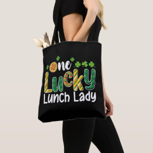 Eine glückliche Schulköchin am St. Patrick's Day Tasche