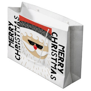 Eine große rot-weiße Tasche für ein Weihnachtsgesc Geschenktüte