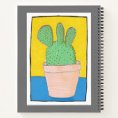 Eine grüne, stachelige Birne in einem Topf mit Ihr Notizblock (Rückseite)