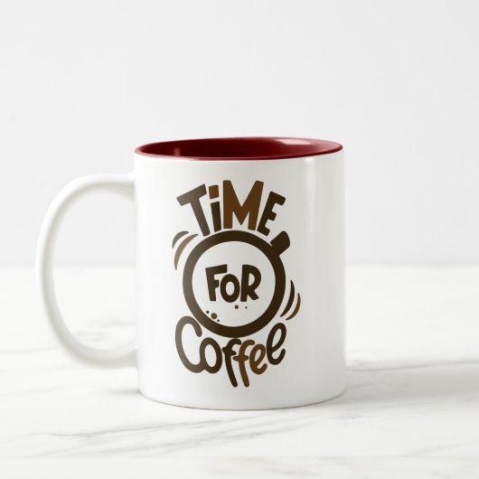 Eine Hand, eine Kaffeetasse (Links)