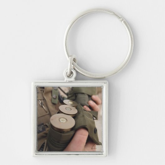 Eine Handvoll mit 40 mm Granaten Schlüsselanhänger (Vorne)