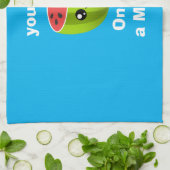 Eine in einem Melon Geschirrtuch (Gefaltet)