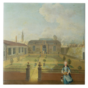 Eine junge Dame mit ihrem Hund vor einem Garten Fliese