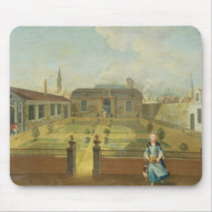 Eine junge Dame mit ihrem Hund vor einem Garten Mousepad