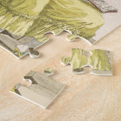 Eine junge Frau in einem Peignoir mit ihrem Puzzle (Seite)