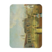 Eine junge Frau mit ihrem Hund vor einem Garten (s Magnet (Vertikal)