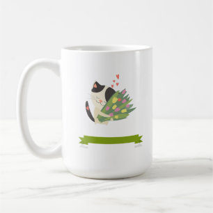 Eine Katze, die ihren Blumenstrauß liebt. Kaffeetasse