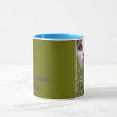 Eine Katze kann sich eine lustige Tasse mit König  (Zentrum)