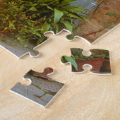 Eine Katze sucht Eintritt in die Zuhause in Pienza Puzzle (Seite)