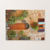 Eine Katze sucht Eintritt in die Zuhause in Pienza Puzzle (Horizontal)